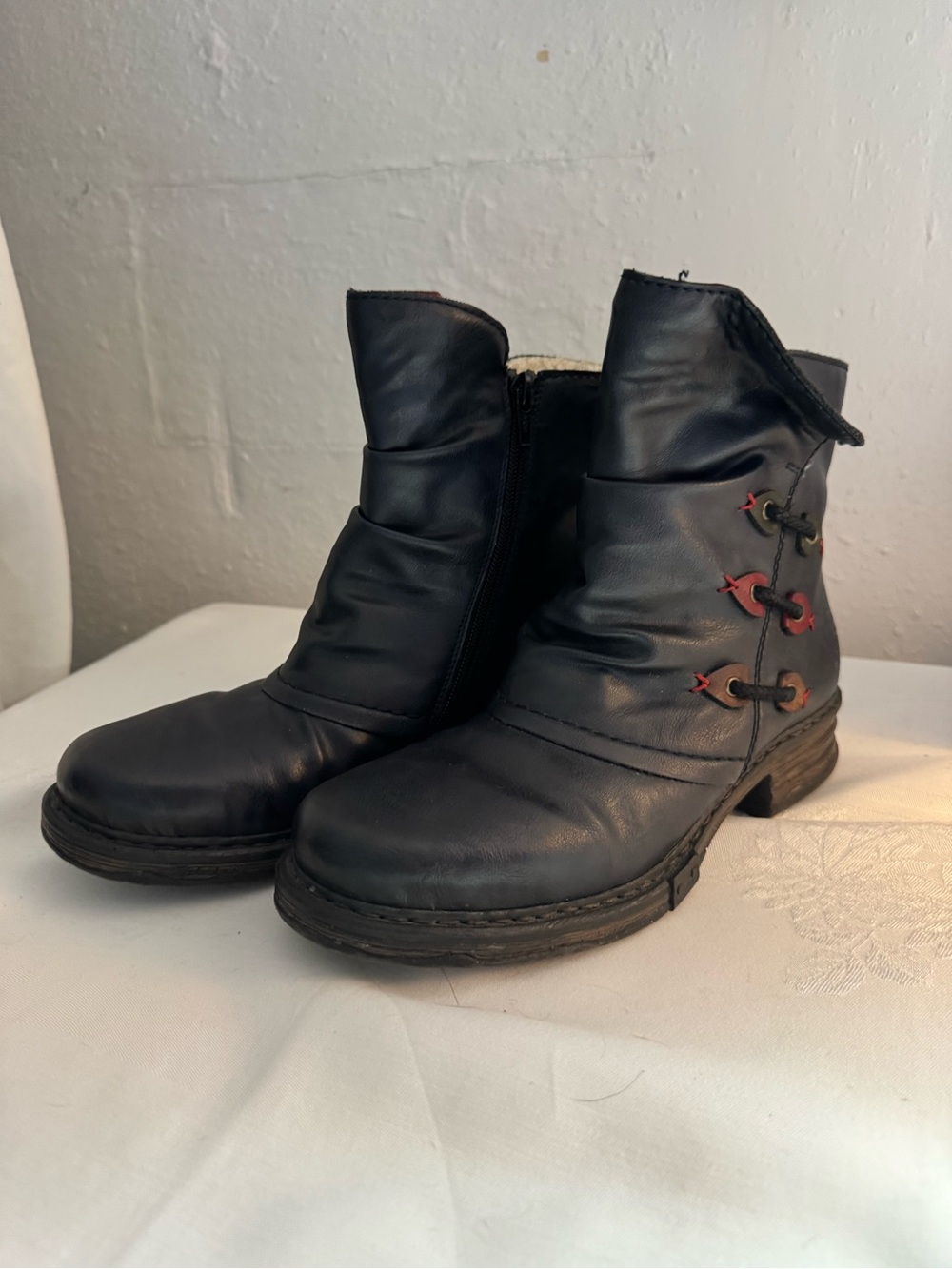 Rieker Black Leather Ankle Boots with Decorative Side Eyelets